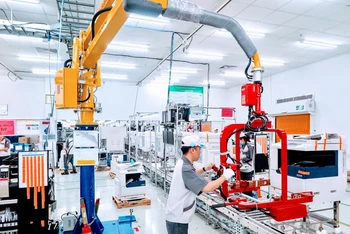 Sản xuất máy photocopy tại doanh nghiệp Nhật Bản trong Khu công nghiệp Vsip Hải Phòng. (Ảnh: NGÔ QUANG DŨNG)