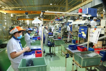Đa số doanh nghiệp đánh giá tích cực về tình hình sản xuất kinh doanh quý I/2023. (Ảnh minh họa: THÀNH ĐẠT)