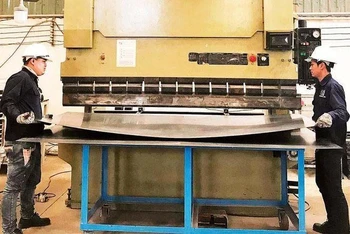 Lao động tại Công ty CP Cơ điện Nam Hòa, Thành phố Hồ Chí Minh. (Ảnh minh họa: Phương Vy)