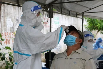 Lấy mẫu xét nghiệm SARS-CoV-2 tại tỉnh Đồng Nai vào tháng 9/2021.