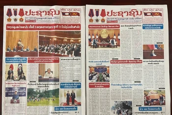 Bài viết đăng hai kỳ trên Báo Pasaxon của Lào ngày 8/7 và 11/7. (Ảnh: DUY TOÀN)