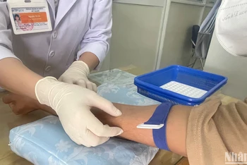 Trường hợp nguy cơ cao được giới thiệu xét nghiệm tại Phòng khám đa khoa Mỹ Thạnh, An Giang.