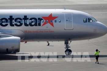 Máy bay của Hãng hàng không Jetstar Japan Co. tại sân bay Narita, tỉnh Chiba (Nhật Bản) ngày 3/7/2012. Ảnh: Bloomberg/TTXVN