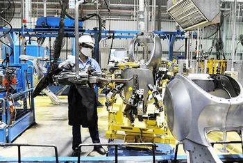 Sản xuất và lắp ráp xe máy tại Công ty TNHH Piaggio Việt Nam (Khu công nghiệp Bình Xuyên, tỉnh Vĩnh Phúc). (Ảnh: LÂM THANH)