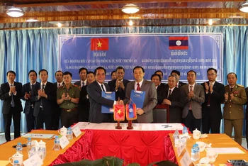 Đoàn đại biểu cấp cao Sơn La-Phongsaly ký biên bản ghi nhớ.