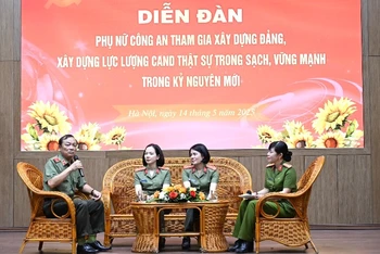 Các điển hình tham gia trao đổi tại diễn đàn.