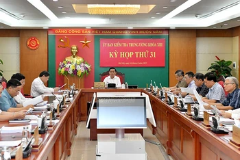 Tại Kỳ họp thứ 31, Ủy ban Kiểm tra Trung ương báo cáo, đề nghị Bộ Chính trị, Ban Bí thư xem xét, quyết định xử lý kỷ luật đối với các đồng chí Lê Đức Thọ và Phạm Gia Luật. (Ảnh: Đăng Khoa)