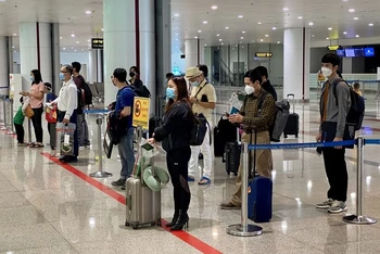Nhu cầu nhập cảnh Việt Nam của bà con Việt kiều, người nước ngoài tăng mạnh trở lại. (Ảnh: TTXVN)