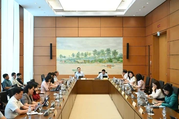 Quốc hội thảo luận tại tổ về dự án Luật Khoa học, Công nghệ và Đổi mới sáng tạo. Ảnh: DUY LINH