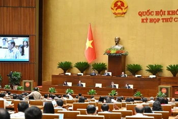 Quốc hội thảo luận ở hội trường về dự án Luật sửa đổi, bổ sung một số điều của Luật Tổ chức Tòa án nhân dân. (Ảnh: THỦY NGUYÊN)