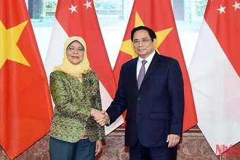 Thủ tướng Phạm Minh Chính và Tổng thống Cộng hòa Singapore Halimah Yacob.