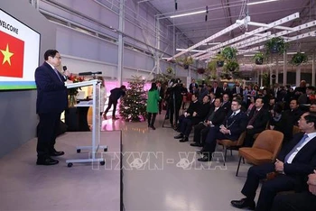 Thủ tướng Phạm Minh Chính phát biểu tại Trung tâm Nhà vườn thế giới-World Horti Center. (Ảnh: Dương Giang/TTXVN)