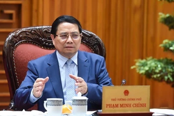 Thủ tướng Chính phủ Phạm Minh Chính phát biểu ý kiến tại cuộc họp. (Ảnh: TRẦN HẢI)