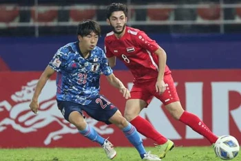U23 Nhật Bản (áo xanh) sớm nói lời chia tay VCK U23 châu Á 2020 sau trận thua U23 Syria tối 12-1.