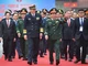 Đại tướng Phan Văn Giang, Ủy viên Bộ Chính trị, Phó Bí thư Quân ủy Trung ương, Bộ trưởng Quốc phòng và Thượng tướng Đổng Quân, Ủy viên Trung ương Đảng Cộng sản Trung Quốc, Bộ trưởng Quốc phòng Trung Quốc tại lễ đón.