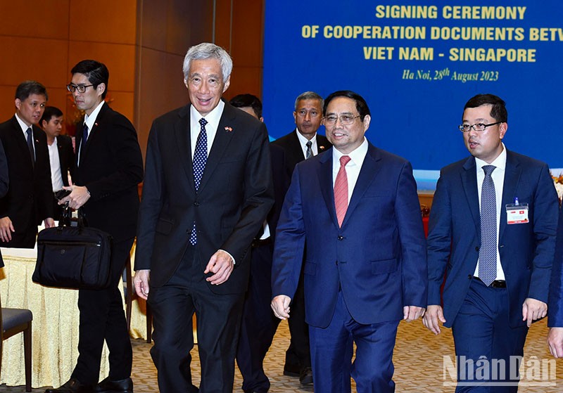 [Ảnh] Thủ tướng Phạm Minh Chính và Thủ tướng Singapore Lý Hiển Long chứng kiến Lễ ký kết văn kiện hợp tác ảnh 9