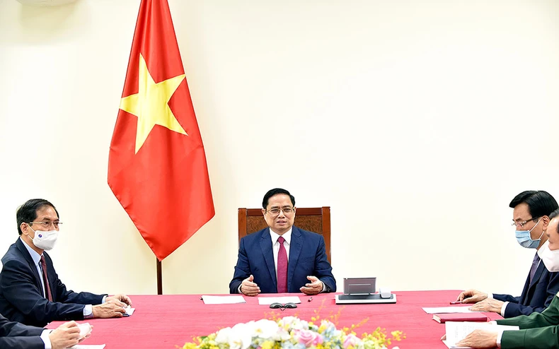 Thủ tướng Phạm Minh Chính điện đàm với Thủ tướng Trung Quốc Lý Khắc Cường -0