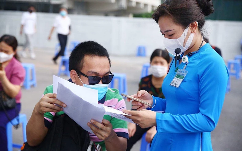 Tiêm vaccine cho người khuyết tật và yếu thế -0