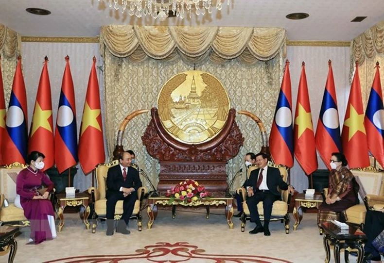Tổng Bí thư, Chủ tịch nước Lào đón, hội đàm với Chủ tịch nước Nguyễn Xuân Phúc -0