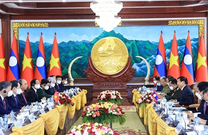 Tổng Bí thư, Chủ tịch nước Lào đón, hội đàm với Chủ tịch nước Nguyễn Xuân Phúc -0