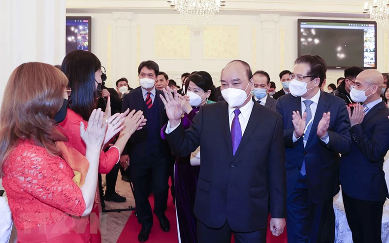 Hình ảnh Chủ tịch nước Nguyễn Xuân Phúc gặp gỡ đại diện cộng đồng Việt Nam tại Nga -0