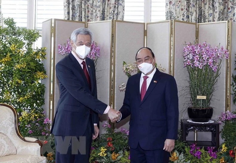 Lễ đón Chủ tịch nước Nguyễn Xuân Phúc thăm cấp Nhà nước tới Singapore -0