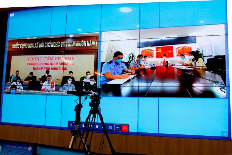 Hội đàm trực tuyến thúc đẩy việc thông quan hàng hóa qua cửa khẩu -0