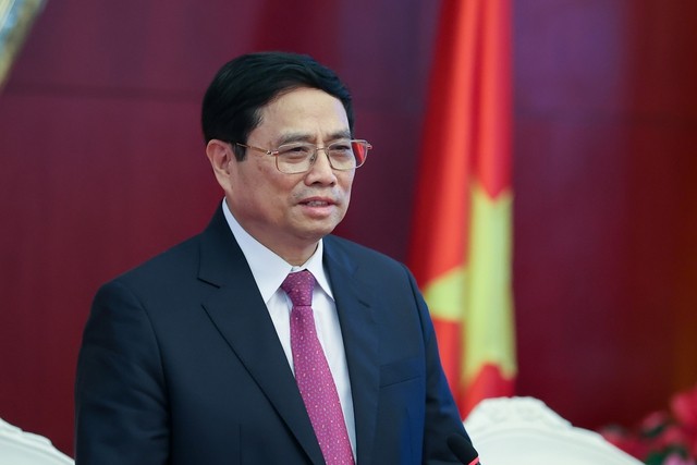 Thủ tướng Phạm Minh Chính thăm, nói chuyện với bà con cộng đồng người Việt Nam tại Trung Quốc ảnh 3