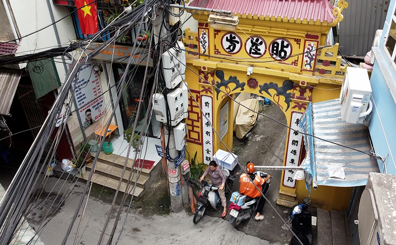 Chật chội “làng” trong phố ảnh 3