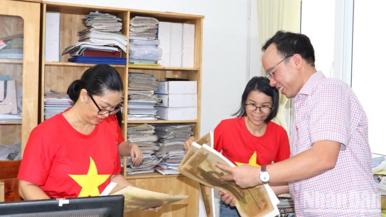 Phát miễn phí phụ san đặc biệt Báo Nhân Dân tại Đồng Nai ảnh 2