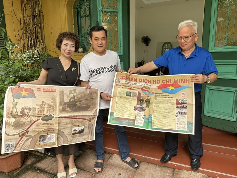 Người dân Hải Phòng hào hứng với phụ san đặc biệt Báo Nhân Dân trong ngày 30/4 ảnh 2