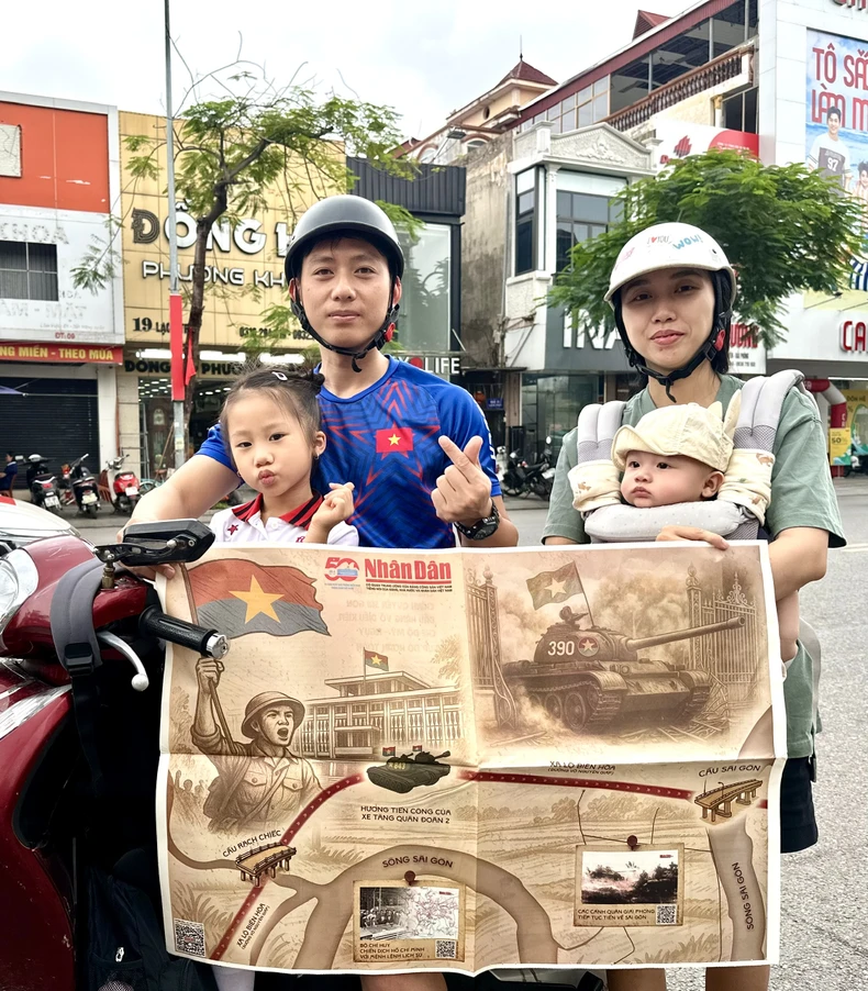 Người dân Hải Phòng hào hứng với phụ san đặc biệt Báo Nhân Dân trong ngày 30/4 ảnh 1