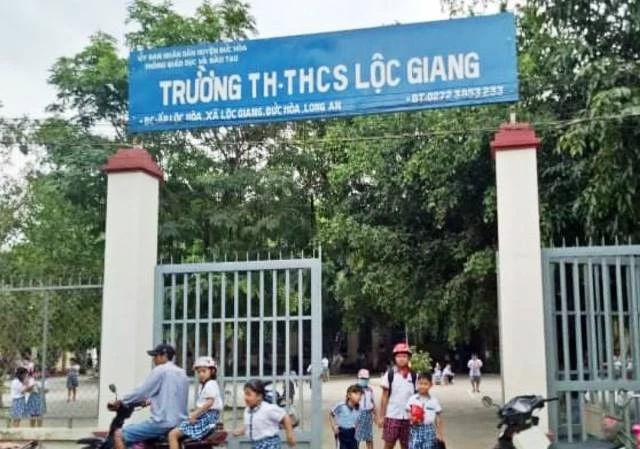 Trường tiểu học - THCS Lộc Giang, nơi xảy ra sự việc phụ huynh xông vào trường đánh giáo viên bị chấn thương phải nhập viện cấp cứu.