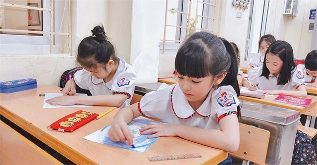 Giờ học của học sinh lớp 3 Trường tiểu học Thăng Long (quận Hoàn Kiếm). Ảnh: MINH HÀ
