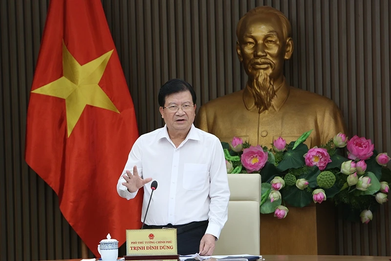 Phó Thủ tướng Trịnh Đình Dũng phát biểu tại cuộc họp về phương án phân vùng giai đoạn 2021-2030. Ảnh: NHẬT BẮC.