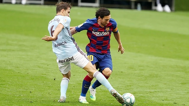 Messi (áo sẫm) vẫn tỏa sáng với hai lần kiến tạo, nhưng không thể giúp Barca vượt qua Celta Vigo.