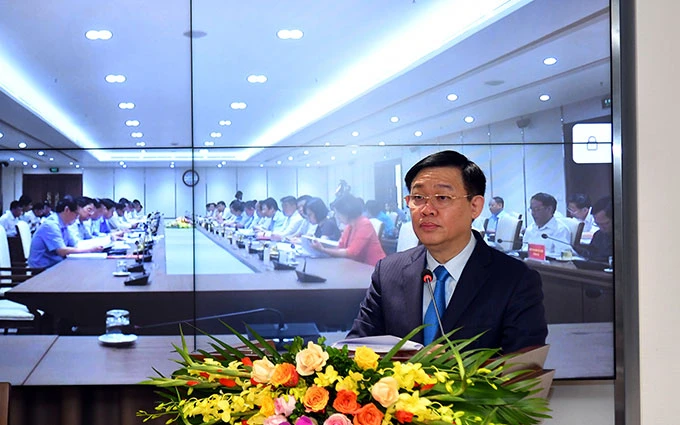 Đồng chí Vương Đình Huệ, Ủy viên Bộ Chính trị, Bí thư Thành ủy Hà Nội phát biểu ý kiến tại hội nghị. Ảnh: DUY LINH
