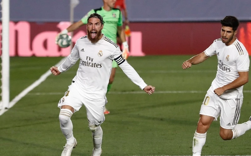 Sergio Ramos (trái) ghi bàn thắng duy nhất của trận đấu, giúp Real Madrid có chiến thắng quan trọng trên sân nhà trước Getafe. (Ảnh: Real Madrid CF) 