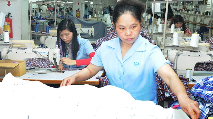 Khi EVFTA có hiệu lực, ngành dệt may Việt Nam gặp nhiều thuận lợi nhưng cũng không ít khó khăn. Ảnh: LAM ANH