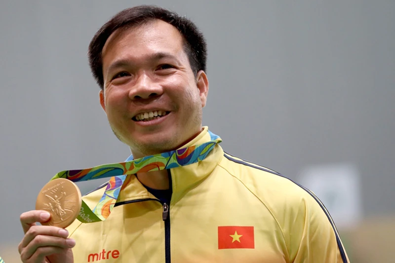 Hoàng Xuân Vinh là VĐV thể thao Việt Nam đầu tiên và duy nhất tính đến nay giành được HCV tại Olympic. (Ảnh: IOC)