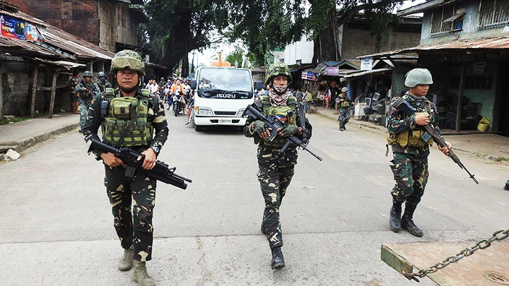 Các binh sĩ Philippines bảo đảm an ninh trên đảo Jolo. Ảnh: GETTY IMAGES