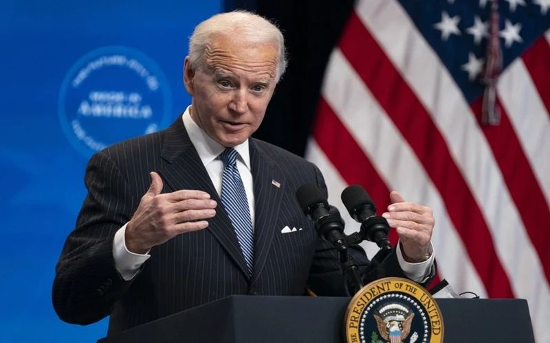 Ông Biden trả lời câu hỏi của phóng viên trong cuộc họp báo tại Nhà trắng, ngày 25-1. (Ảnh: AP)