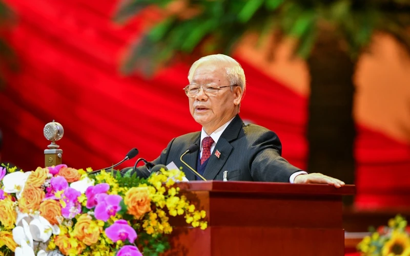 Đồng chí Nguyễn Phú Trọng, Tổng Bí thư, Chủ tịch nước đọc Báo cáo của Ban Chấp hành Trung ương khóa XII về các văn kiện Đại hội XIII của Đảng.