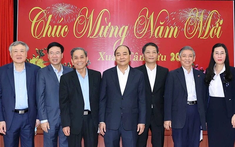 Thủ tướng Nguyễn Xuân Phúc và các đại biểu dự buổi chúc Tết. Ảnh: THỐNG NHẤT (TTXVN)
