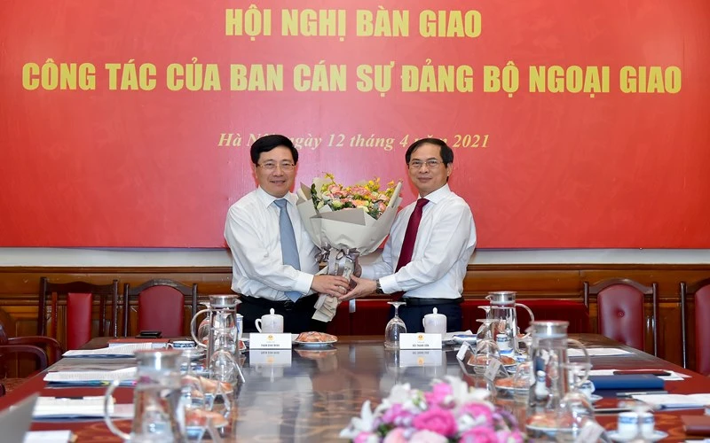 Đồng chí Phạm Bình Minh và đồng chí Bùi Thanh Sơn tại Hội nghị. (Ảnh: Bộ Ngoại giao)