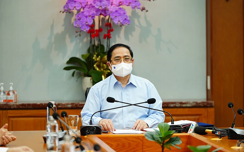 Thủ tướng Phạm Minh Chính làm việc tại Bệnh viện Đại học Y dược TP Hồ Chí Minh. Ảnh: Phạm Nguyễn.