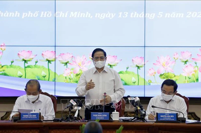 Thủ tướng Phạm Minh Chính phát biểu tại buổi làm việc. (Ảnh: TTXVN)