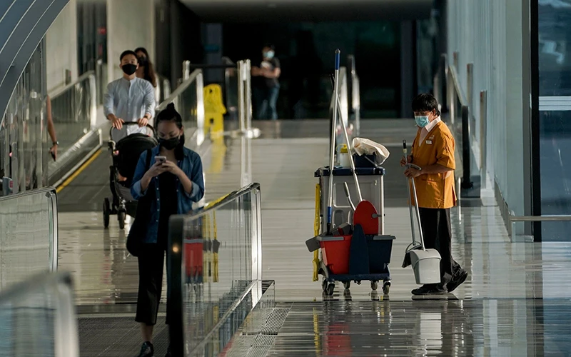 Sân bay ở Xin-ga-po siết chặt các biện pháp phòng dịch. Ảnh nytimes.com