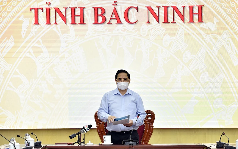 Thủ tướng Phạm Minh Chính làm việc với tỉnh Bắc Ninh về phòng, chống dịch Covid-19. (Ảnh: NHẬT BẮC)