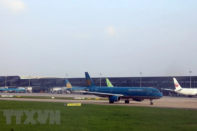 Máy bay của Vietnam Airline đỗ tại sân bay Nội Bài. 